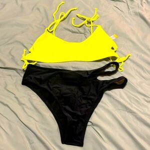 NWT bikini size junior large neon yellow top and black bottoms